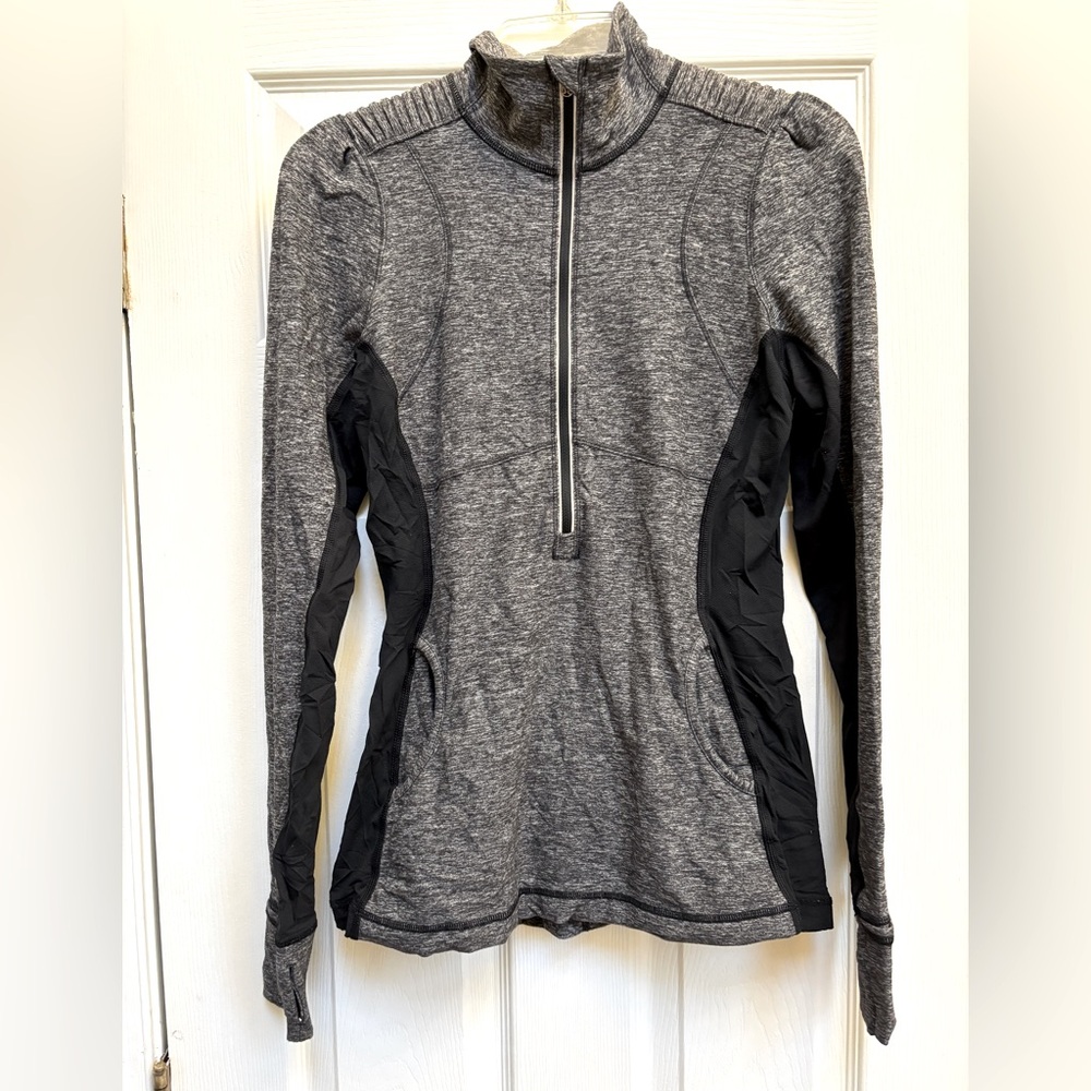 Lululemon zipper pullover with ruffle detail on back